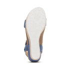 Blue sandal with white sole on a white background