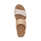 Beige sandal with a strap and buckle on a white background
