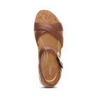 Brown sandal with cork sole on a white background