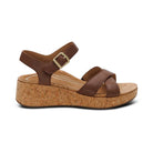 Brown wedge sandal with cork sole on a white background