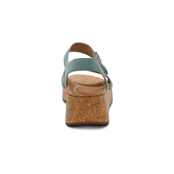 Wedge sandal with cork sole on a white background