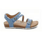 Blue wedge sandal with cork sole on a white background
