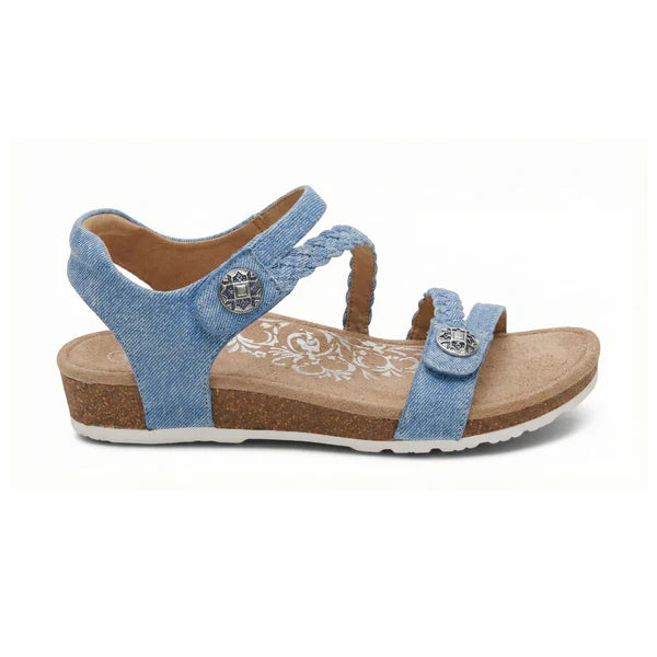 Blue wedge sandal with cork sole on a white background
