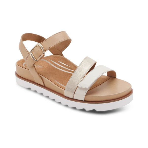 Beige sandal with white sole on a white background