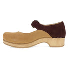 Brown wooden clog shoe on a white background