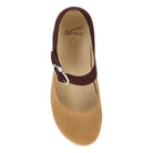 Tan sandal with brown strap and visible Danskos logo on a white background