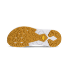 Sole of a shoe with brown tread pattern on a green background