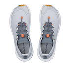 Pair of gray sneakers with orange accents on a white background