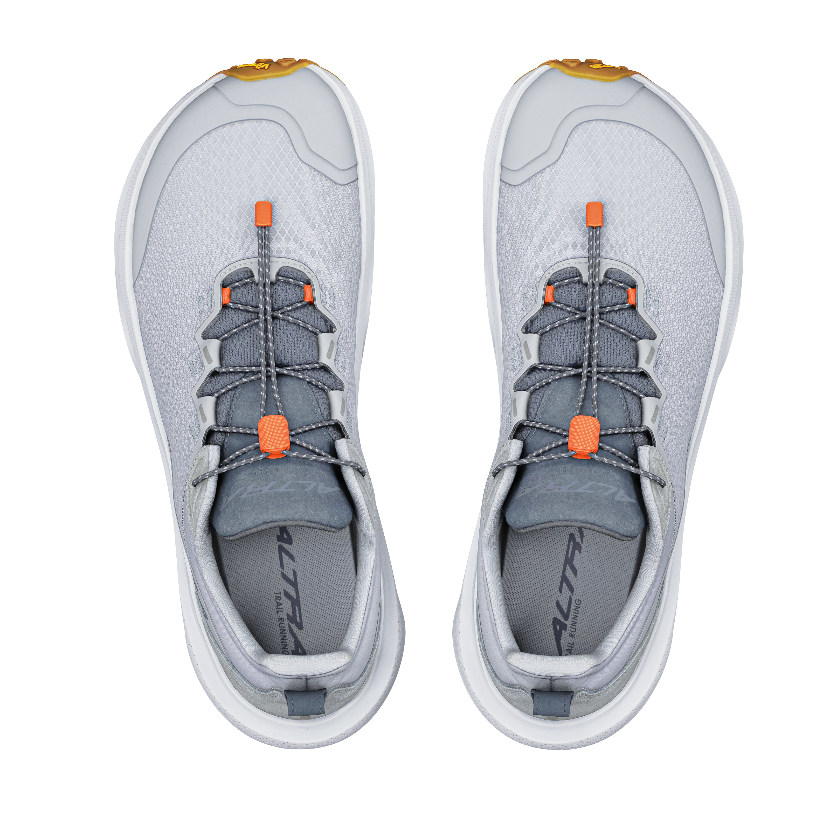 Pair of gray sneakers with orange accents on a white background
