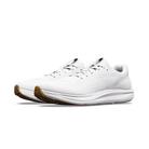 A pair of white athletic sneakers with brown gum outsoles, shown from a side profile view on a clean white background.
