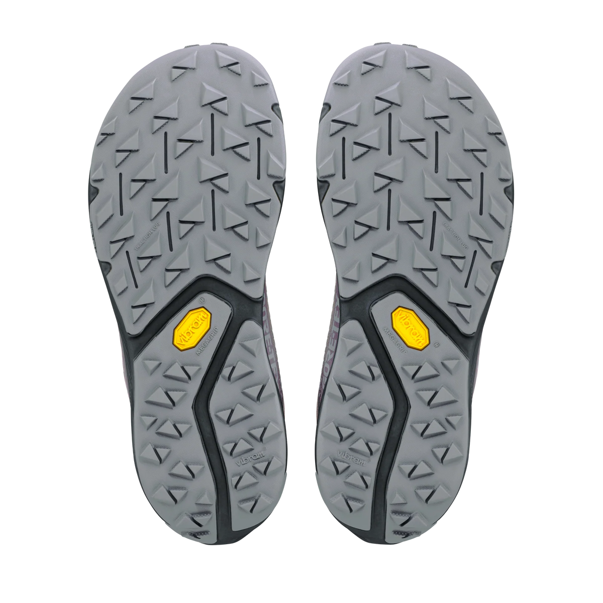 The outsoles of a pair of hiking shoes, showing a gray Vibram tread pattern with bright yellow Vibram logos near the heel, photographed from a top-down view on a white background.