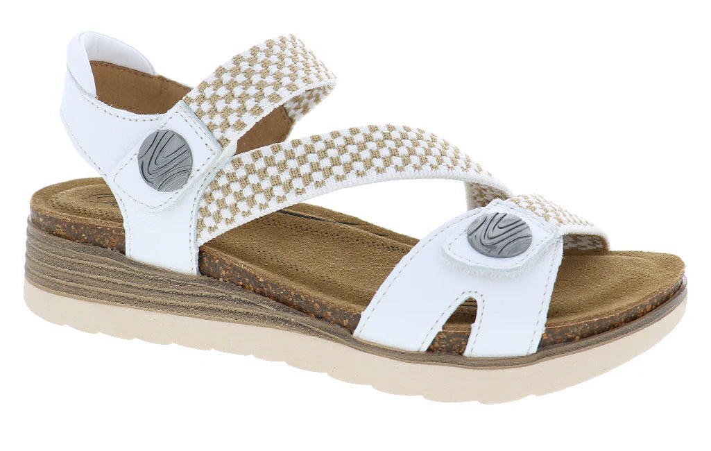 White sandal with brown sole on a white background