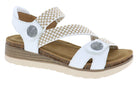 White sandal with brown sole on a white background