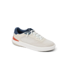 White sneaker with blue and red accents on a white background