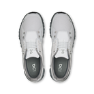 Pair of gray and white athletic shoes on a white background