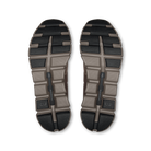 Top view of a pair of hiking shoes with tread pattern on a white background