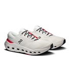White running shoe with red accents on a white background
