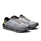 A pair of running shoes in light gray and dark gray with black and gold accents, shown from a three-quarters angle on a white background.
