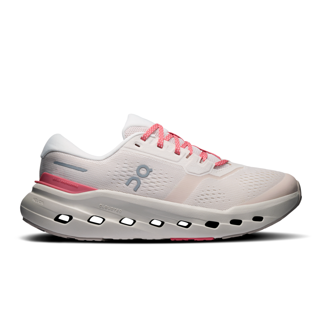 White and pink running shoe on a white background