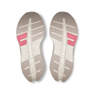 Two shoe soles with a pink sole liner on a white background