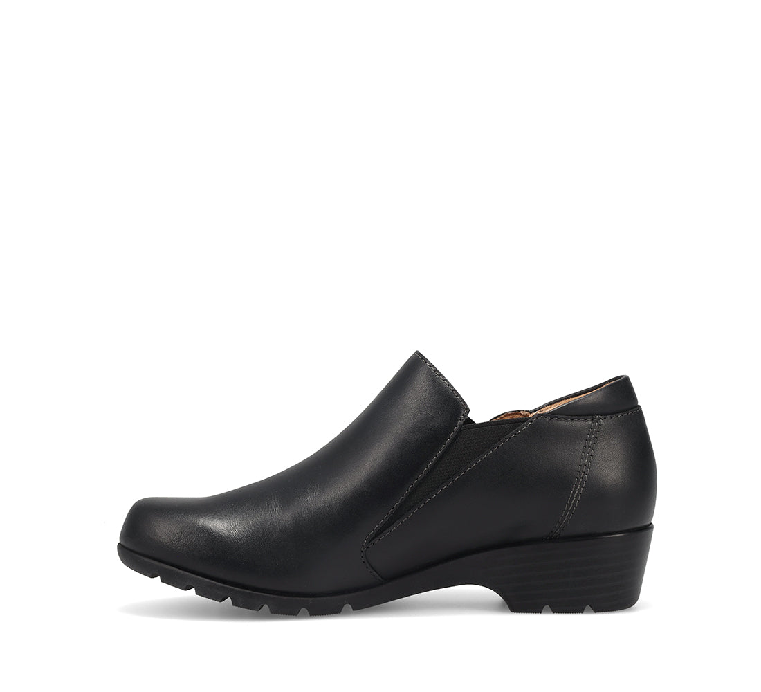 Black leather shoe on a white background