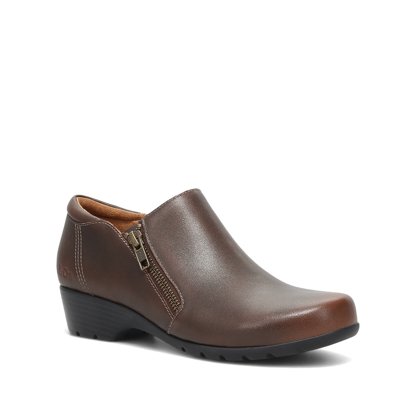 A brown leather slip-on wedge shoe with a side zipper, shown from a three-quarters angle on a white background.