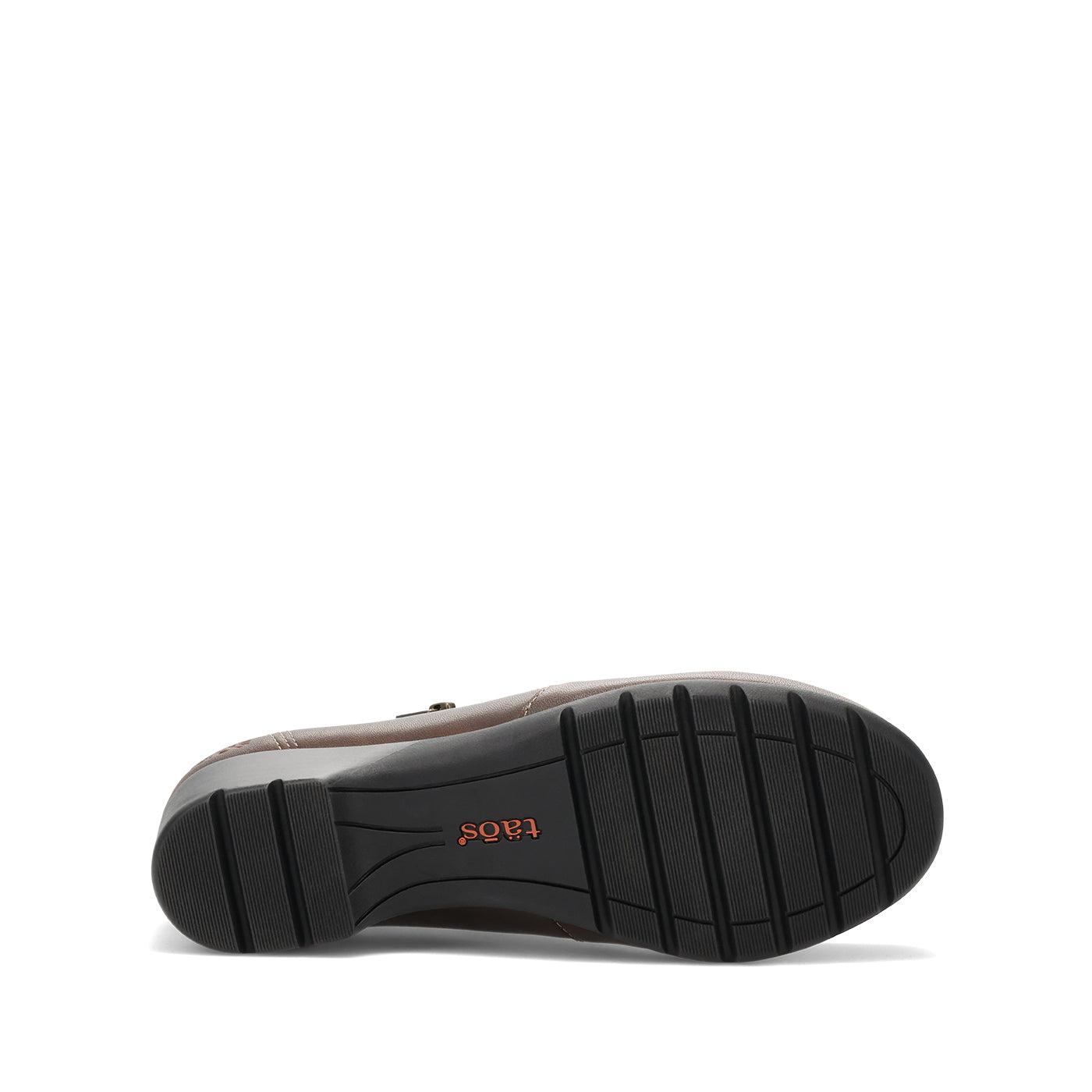 The black rubber outsole of a brown shoe, showing the brand name 'tAOS' in orange text, photographed on a clean white background.