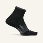 Black ankle sock with 'feetures' branding on a light gray background
