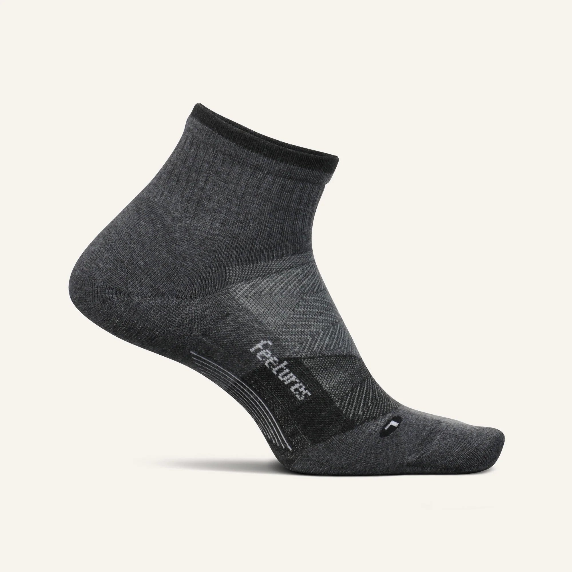Gray ankle sock with black accents on a white background