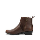 A dark brown leather ankle boot with a side zipper, elastic side panel, and low black wedge heel, shown from a side profile on a white background.