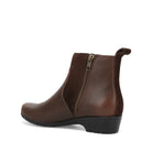 A dark brown leather ankle boot with a side zipper, elastic side panel, and low block heel, shown from a side profile on a white background.
