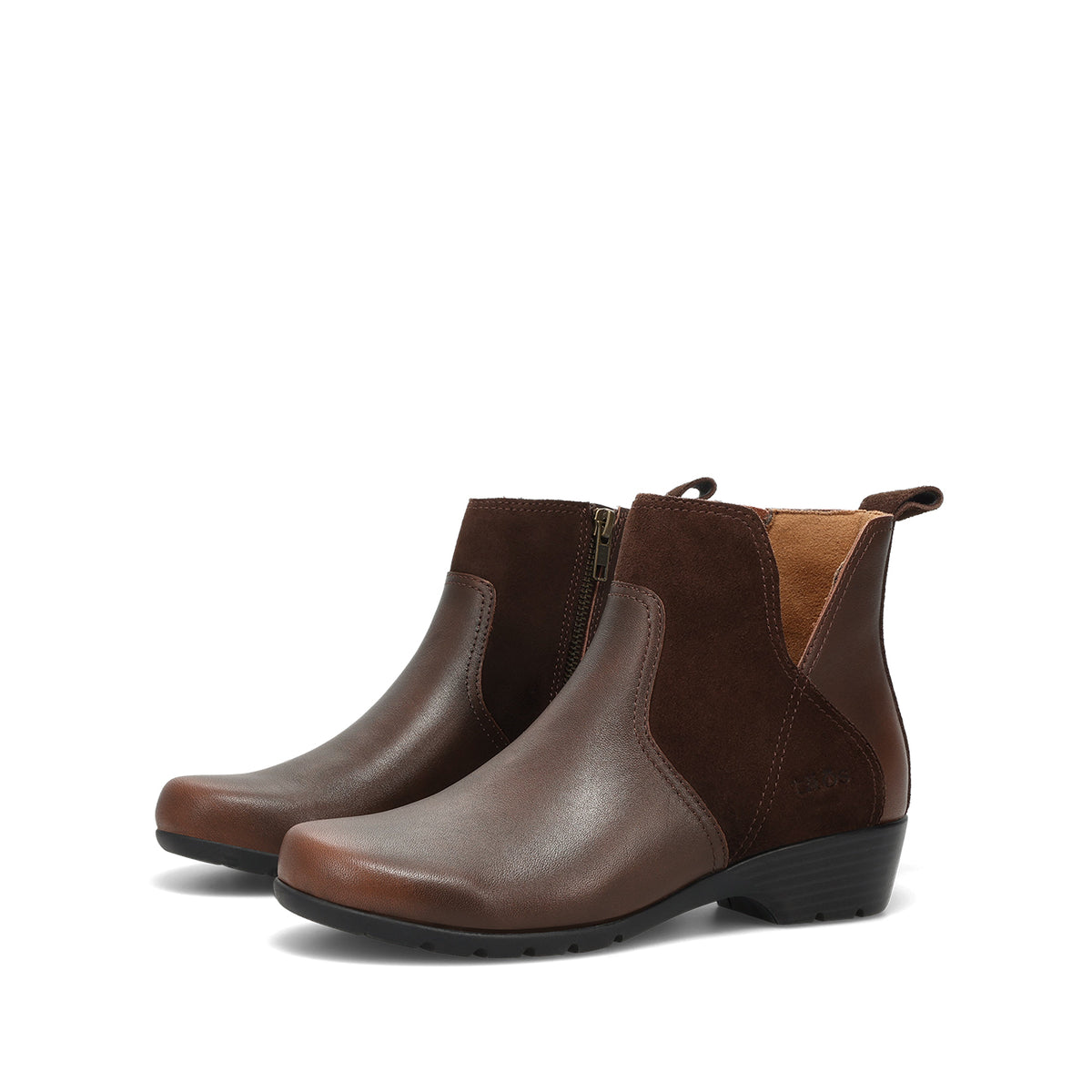A pair of women's brown ankle boots with a mix of smooth leather and suede panels, elastic side gore, and low black wedge heels, shown on a plain white background.