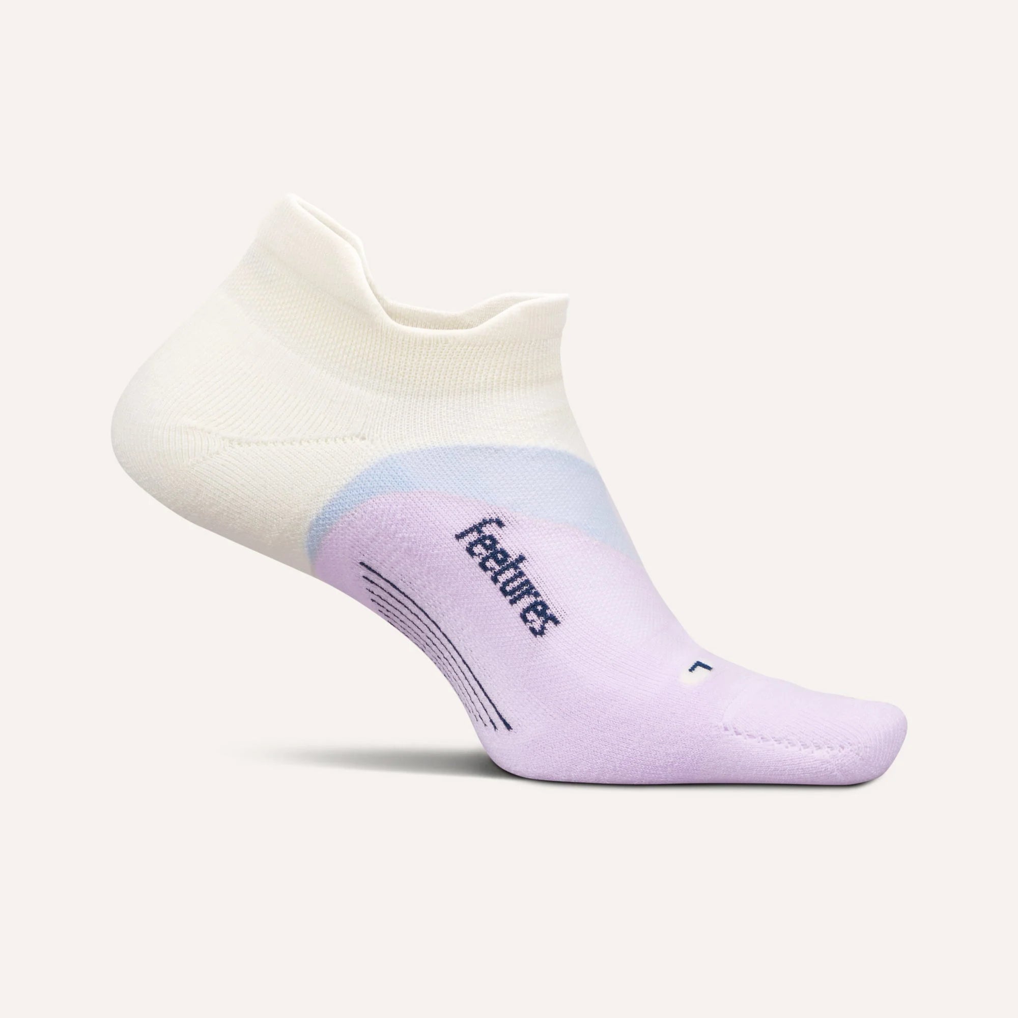 White and purple sock with 'feetures' branding on a white background