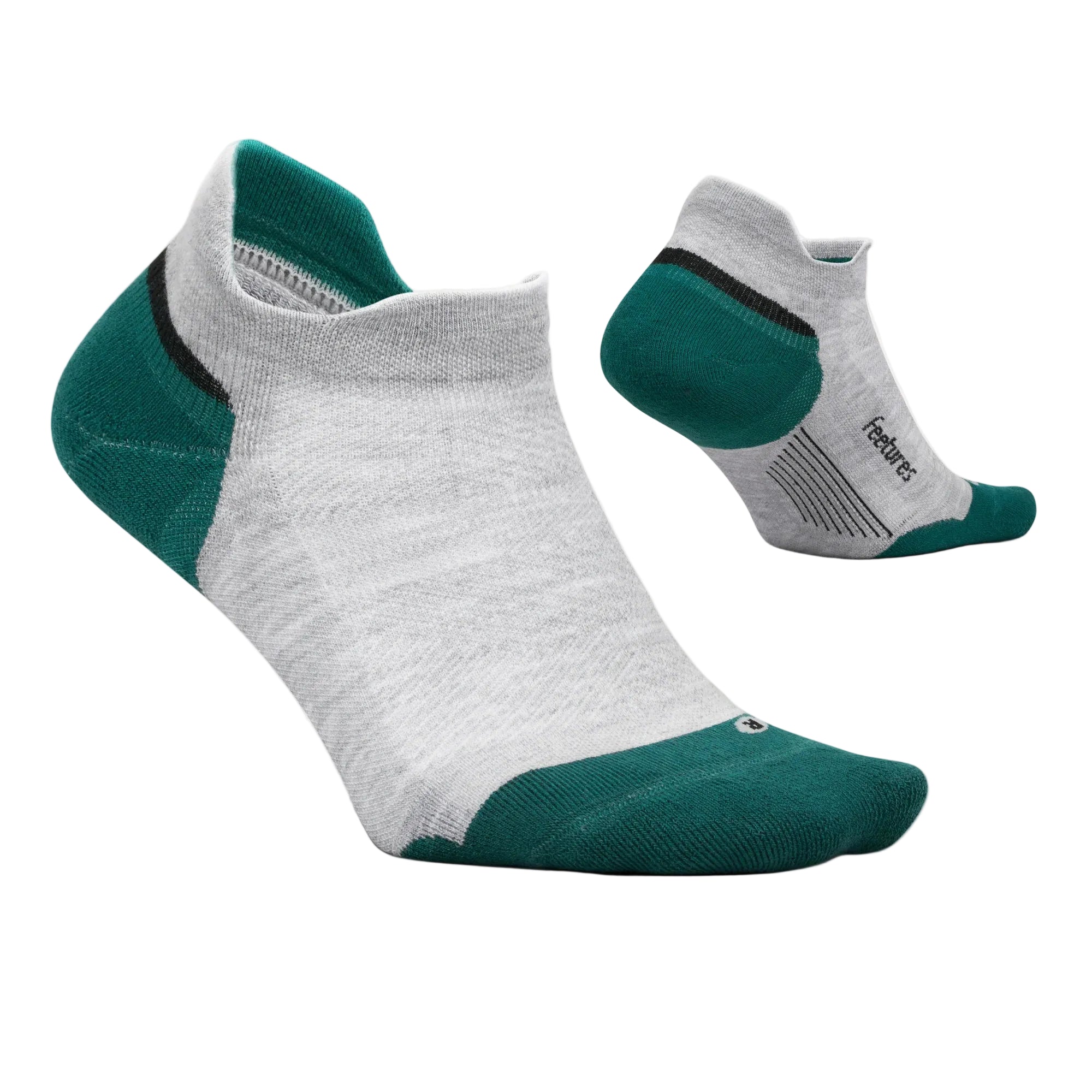Gray and green socks with a close-up of the sole on a light gray background