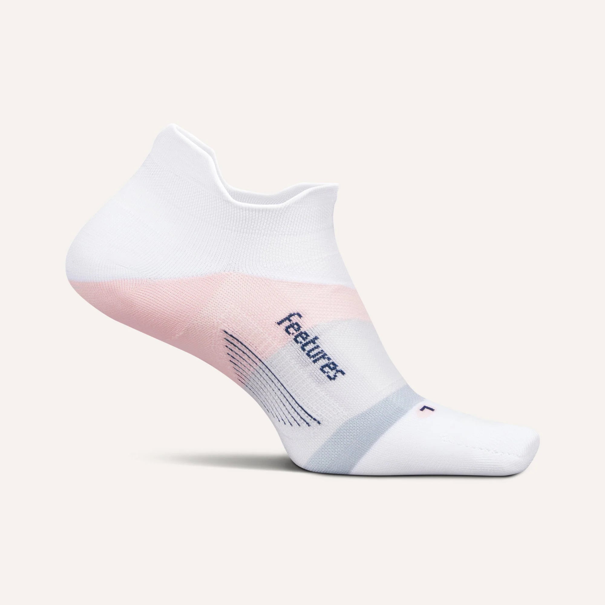 White ankle sock with pink heel and sole on a light gray background