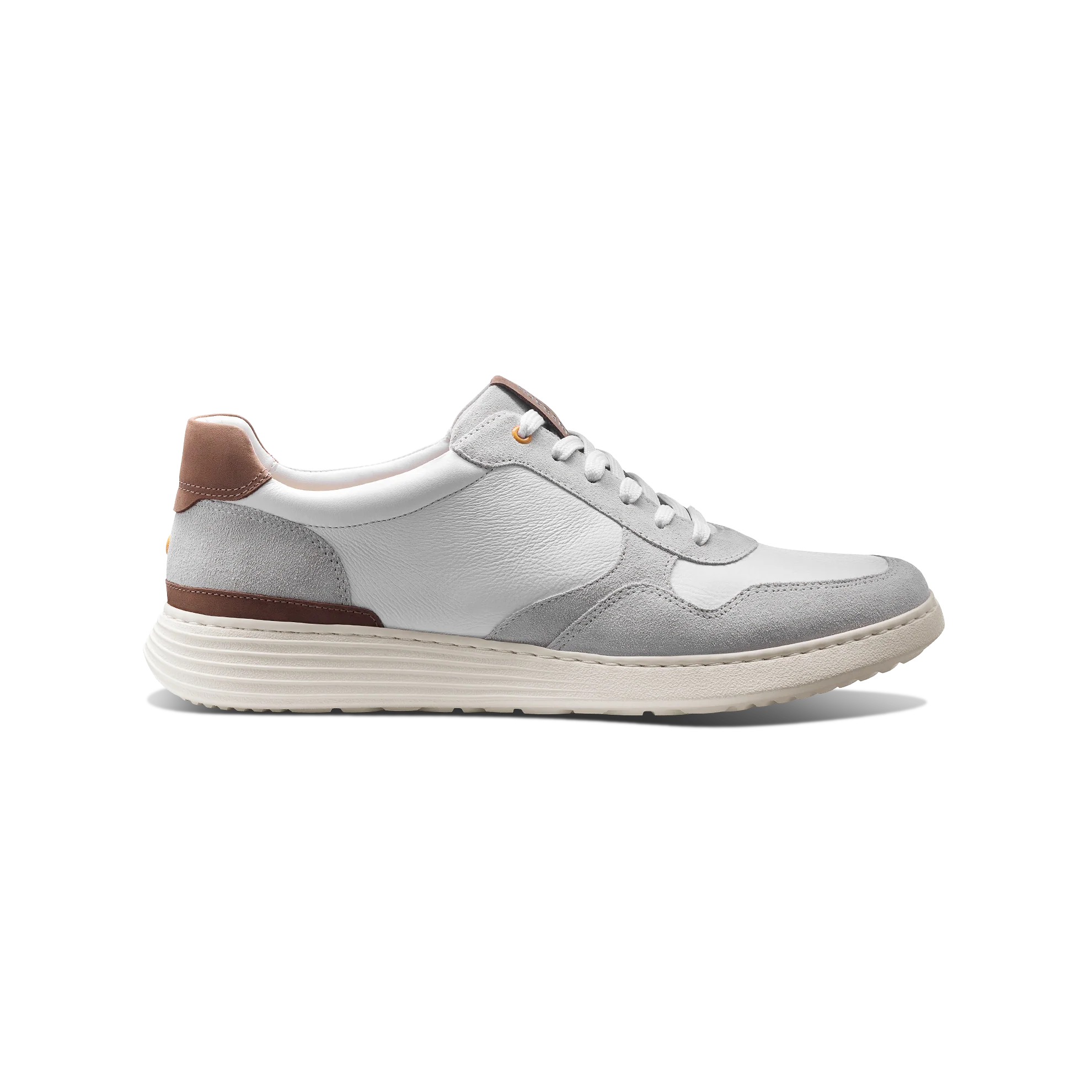 Gray sneaker with brown accents on a white background