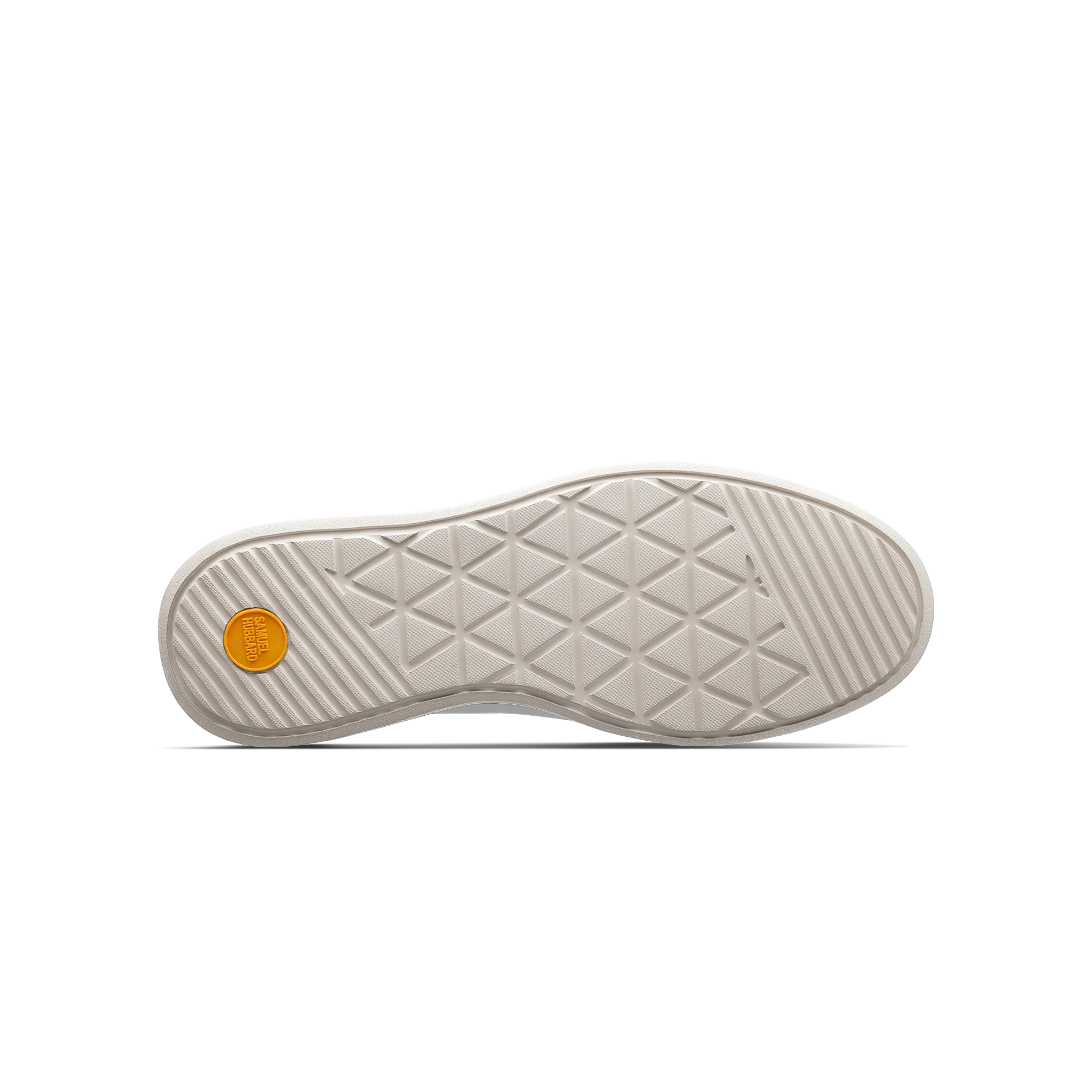 Close-up of a shoe sole with a textured pattern on a white background