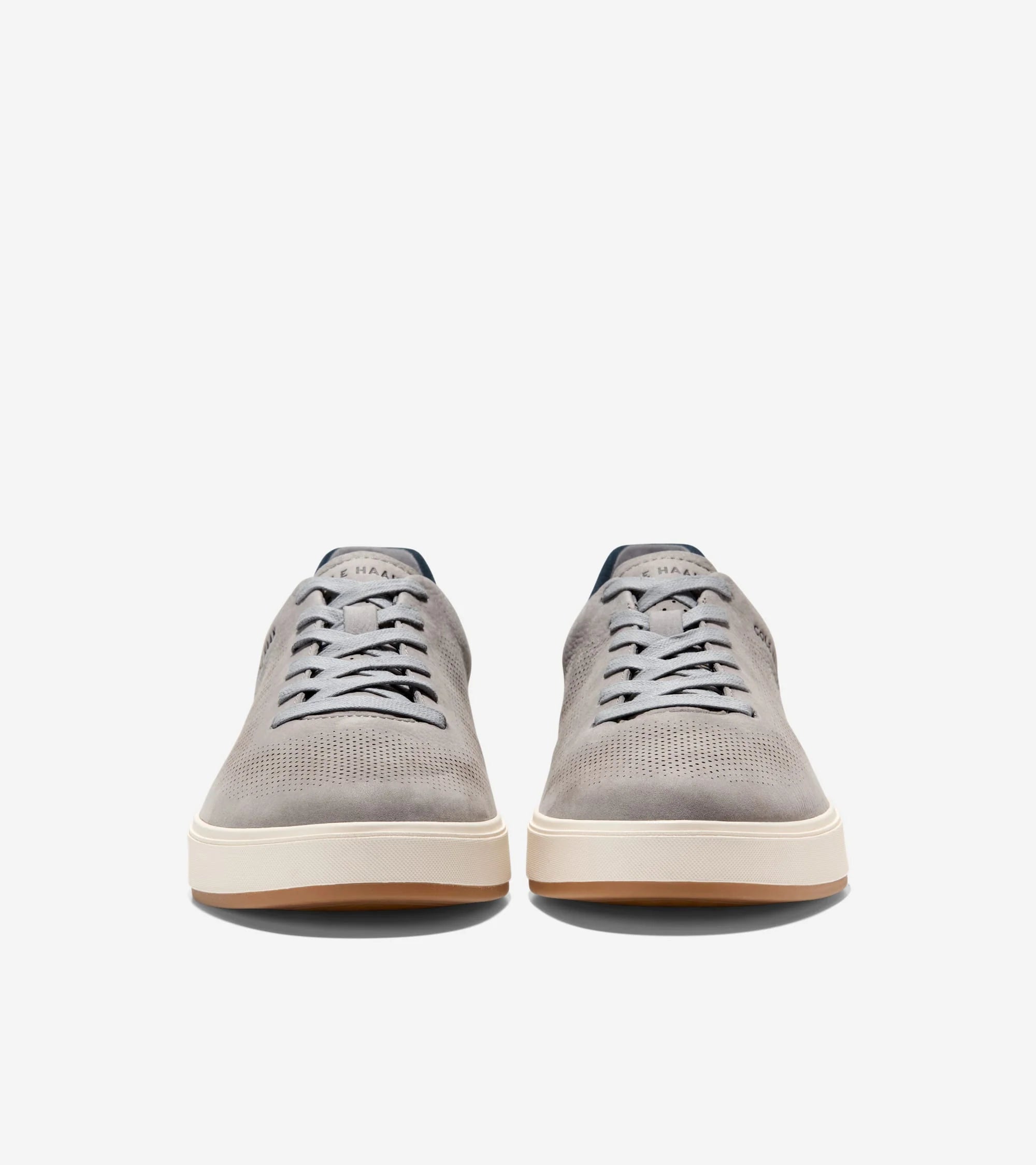 Pair of gray sneakers on a white background