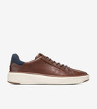 Brown leather sneaker on a white background