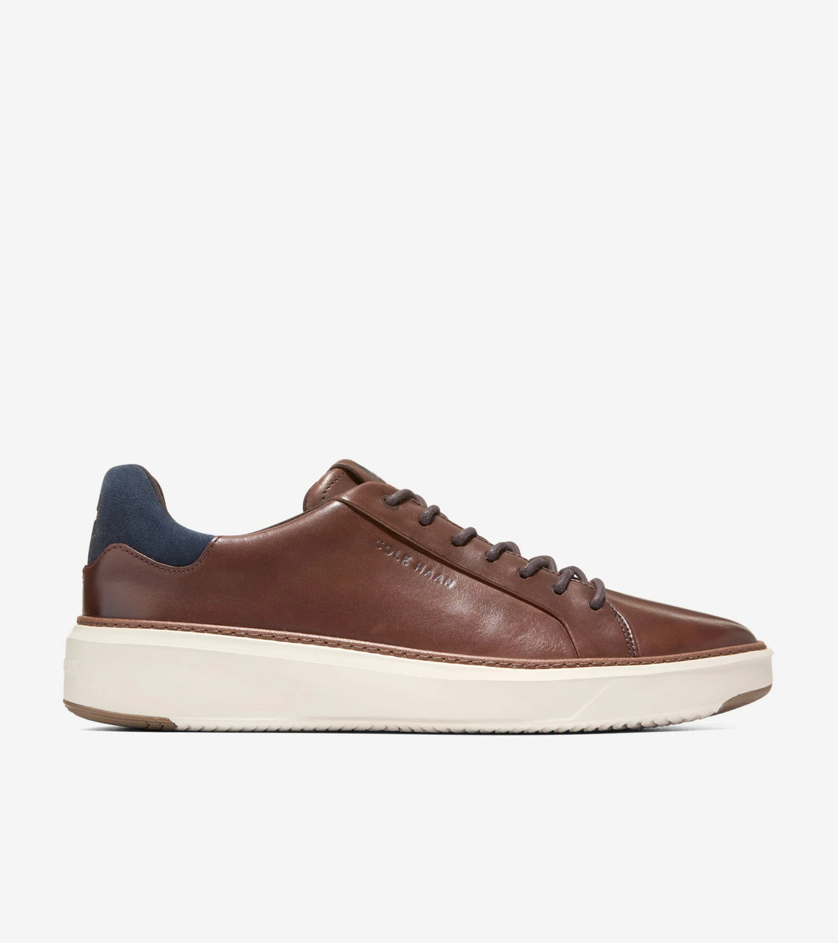 Brown leather sneaker on a white background