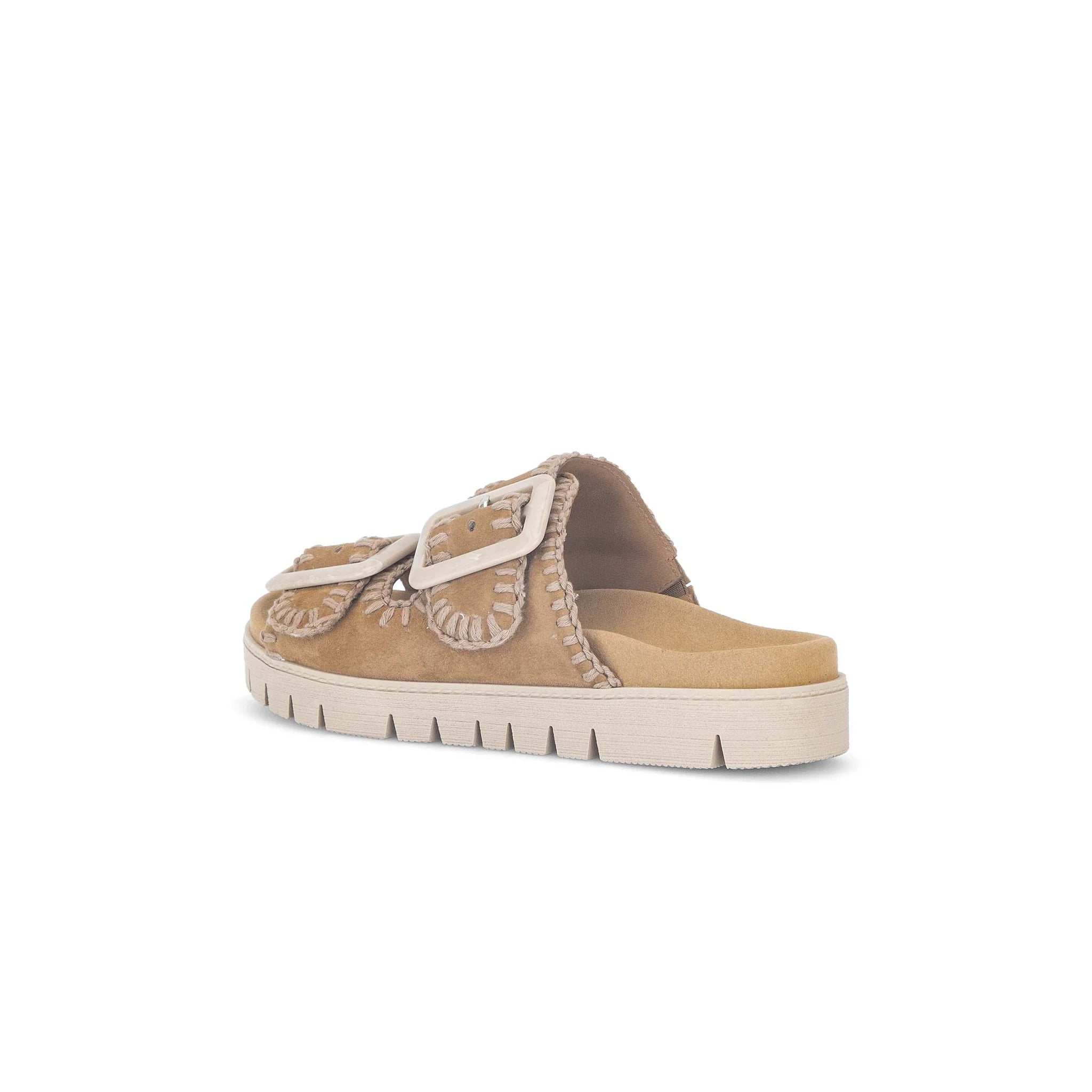 Beige sandal with white sole on a white background