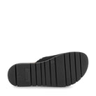 Black shoe sole with brand logo on a white background