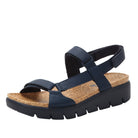 Navy sandal with cork insole on a white background