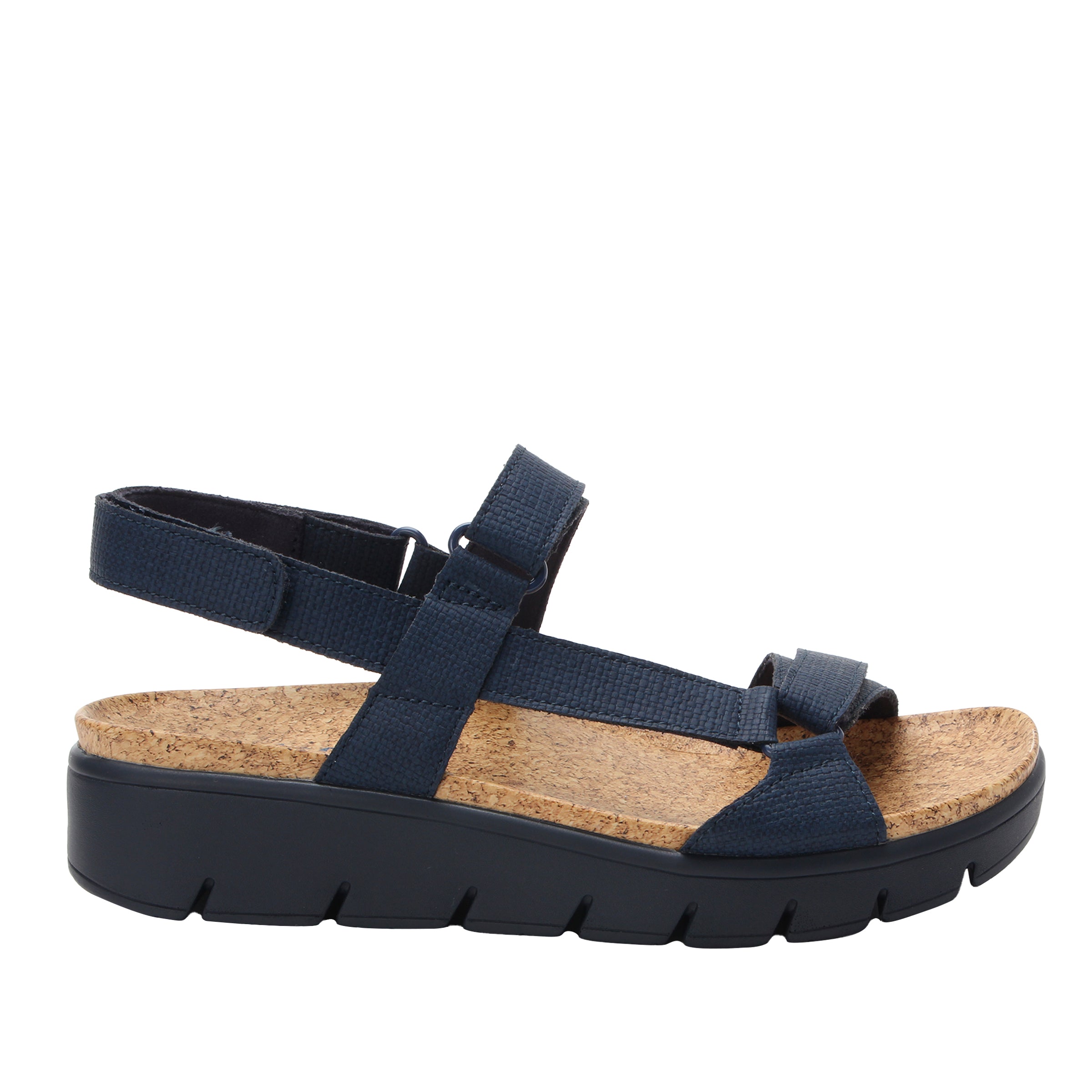 Navy sandal with cork insole on a white background