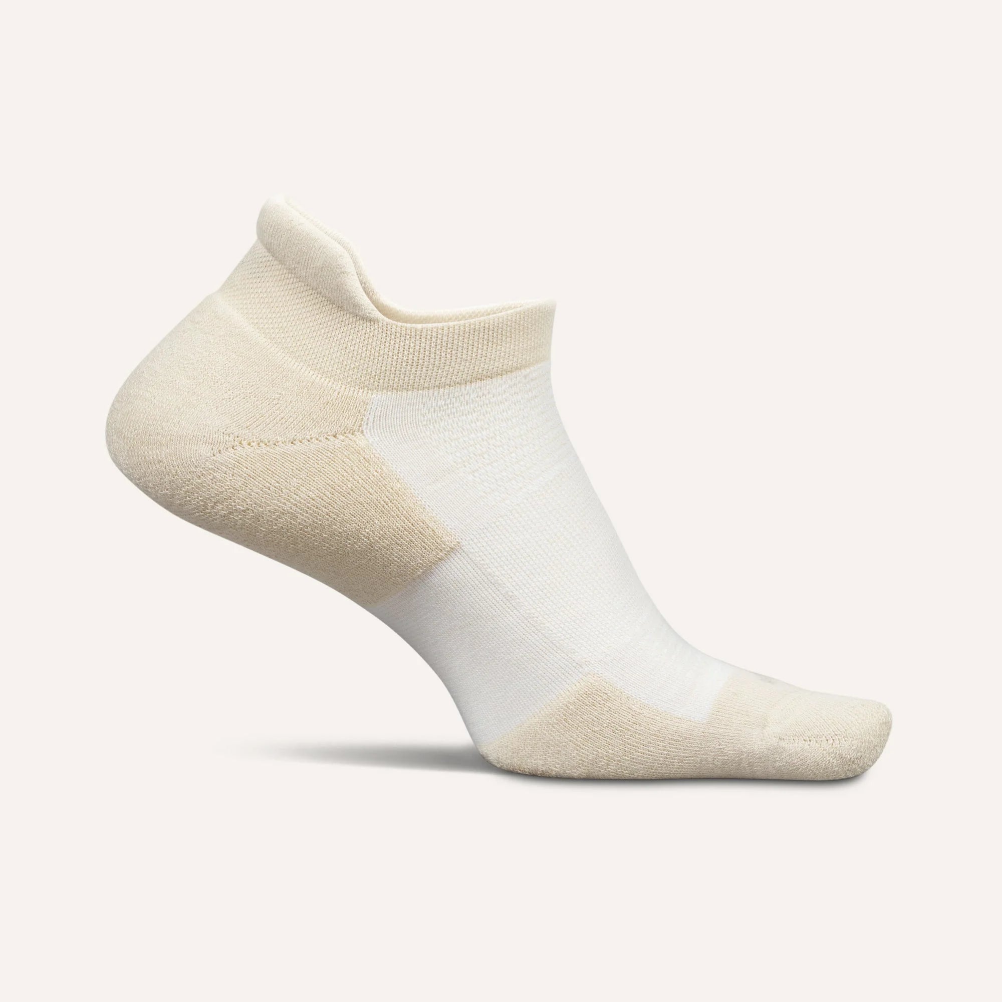 Beige and white ankle sock on a light gray background