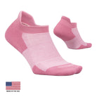 A pair of low-cut athletic socks in shades of pink, shown on a light cream background with a 'Made in the USA' flag graphic in the bottom-left corner.