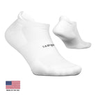 Two white socks with a brand logo on a light gray background, featuring 'Made in the USA' text.