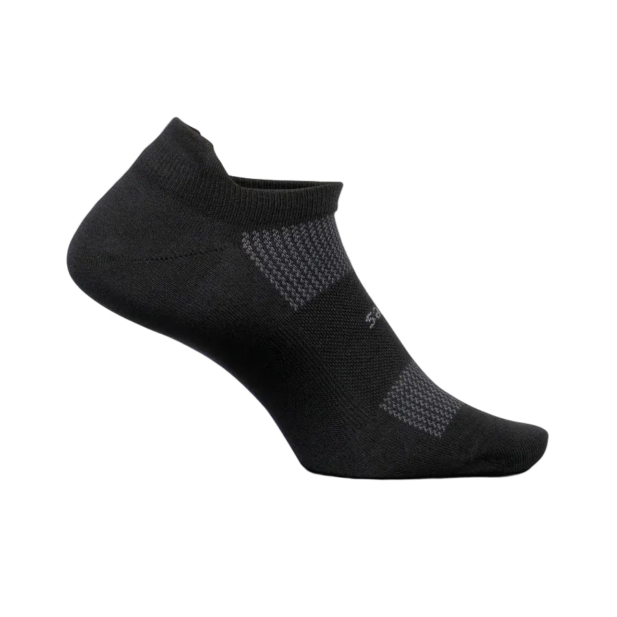 A single black low-cut athletic sock with textured knit panels, shown on a light off-white background.