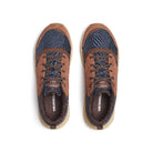 A pair of Merrell hiking shoes shown from a top-down view, featuring brown suede-like uppers, a blue textured knit upper, and a beige sole.
