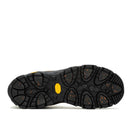 Black sole of a shoe with a yellow dot on a white background